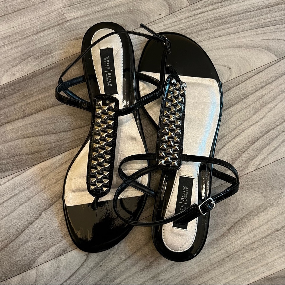 White House Black Market silver studded black thong sandals